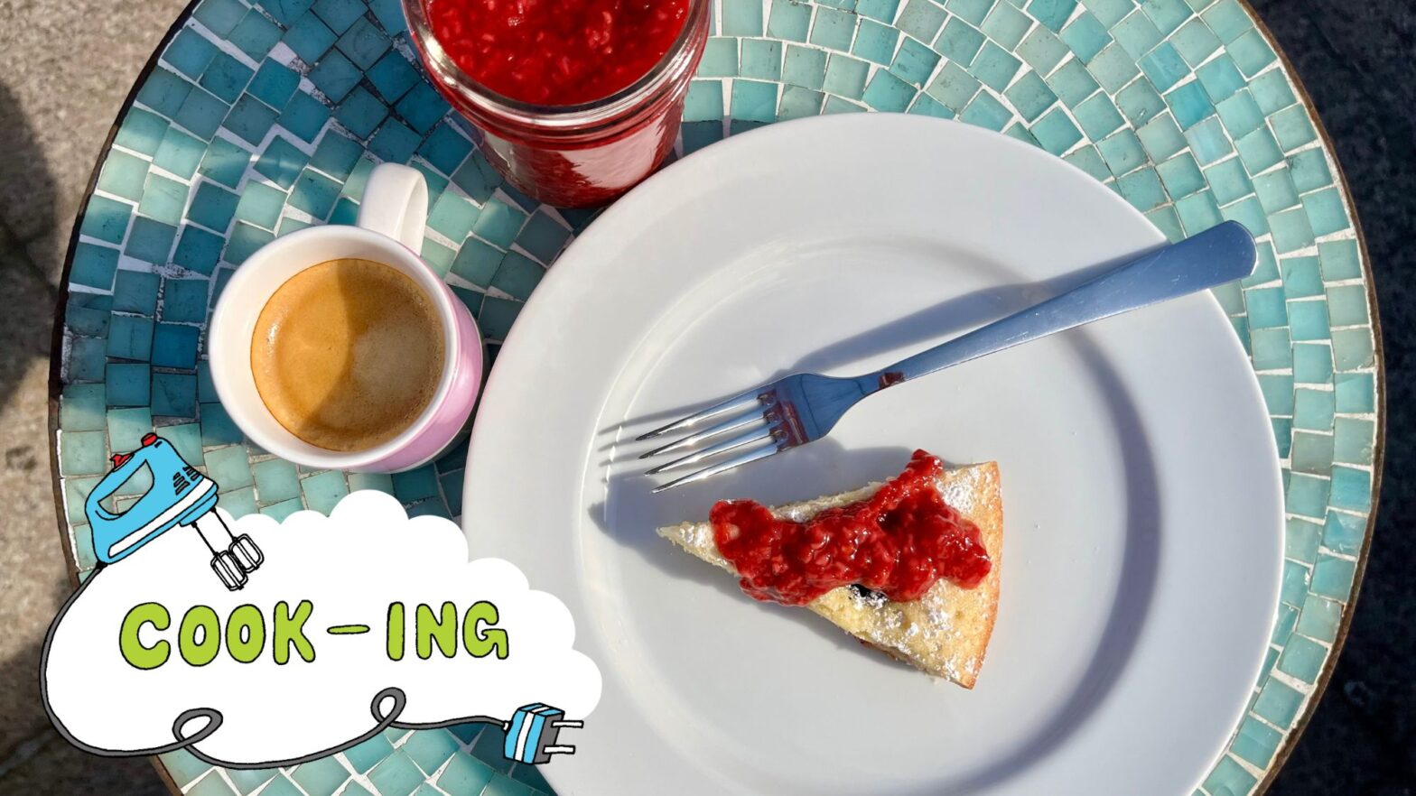 A white plate with a slice of cake topped with red jam, a purple mug of coffee, and a glass jar filled with red jam sit on a blue table. A logo in the lower left corner reads “Cook-ING” with an illustration of a blue hand mixer.