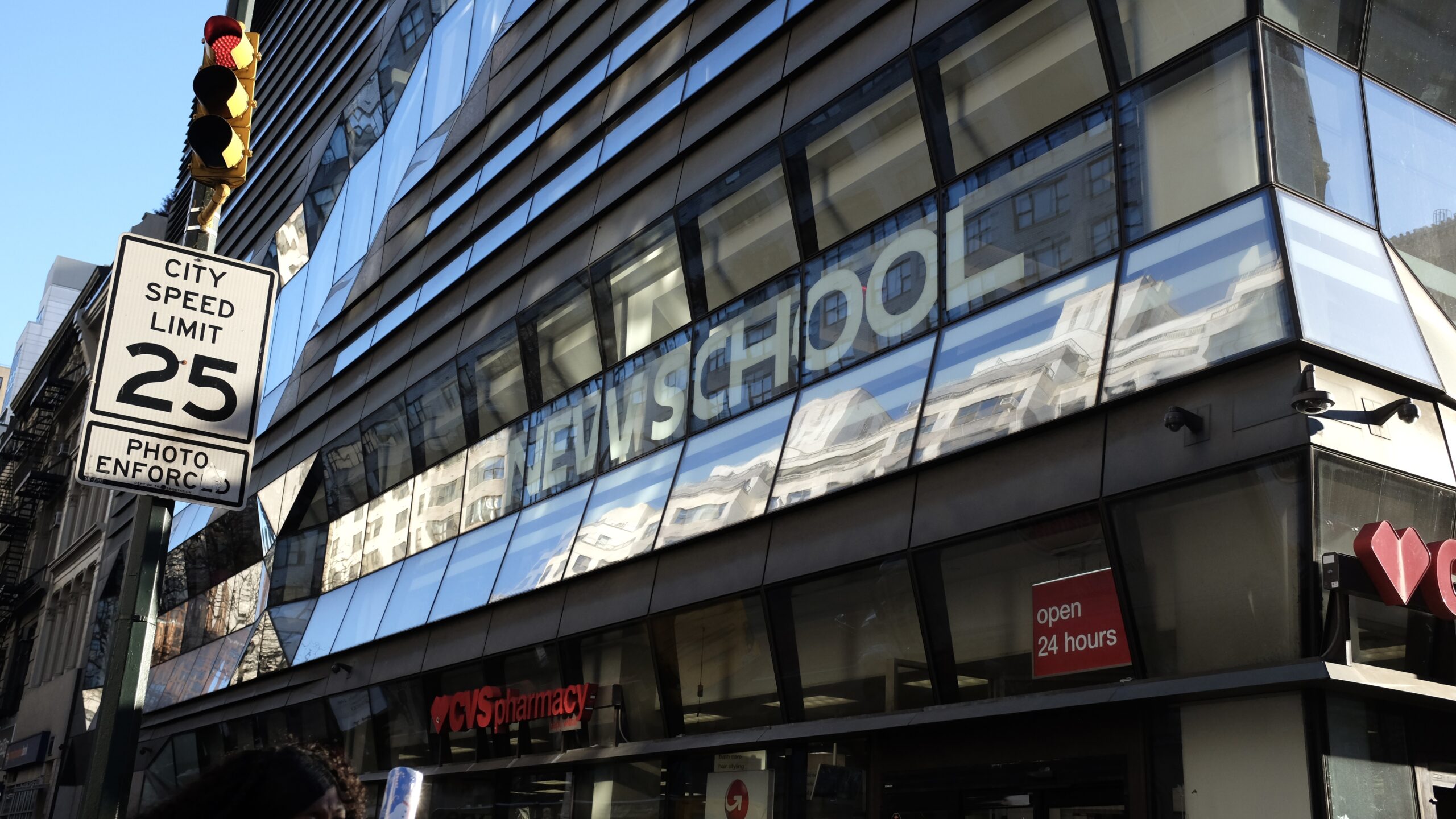 Side of the University Center with “The New School” printed on the side.