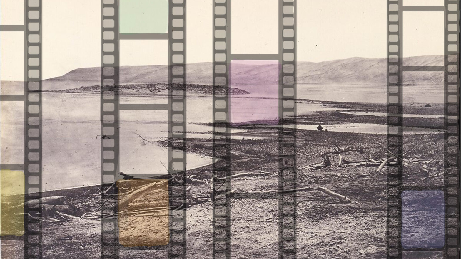 A black & white image of hills and and water, overlaid with opaque film strips in various colors.