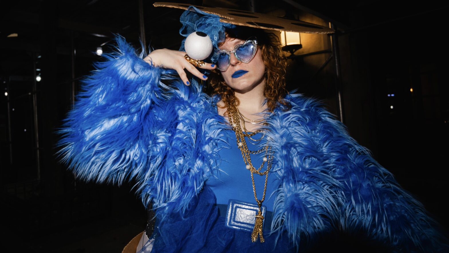 Sara Jean Gruenwald dressed in a blue Cookie Monster outfit.