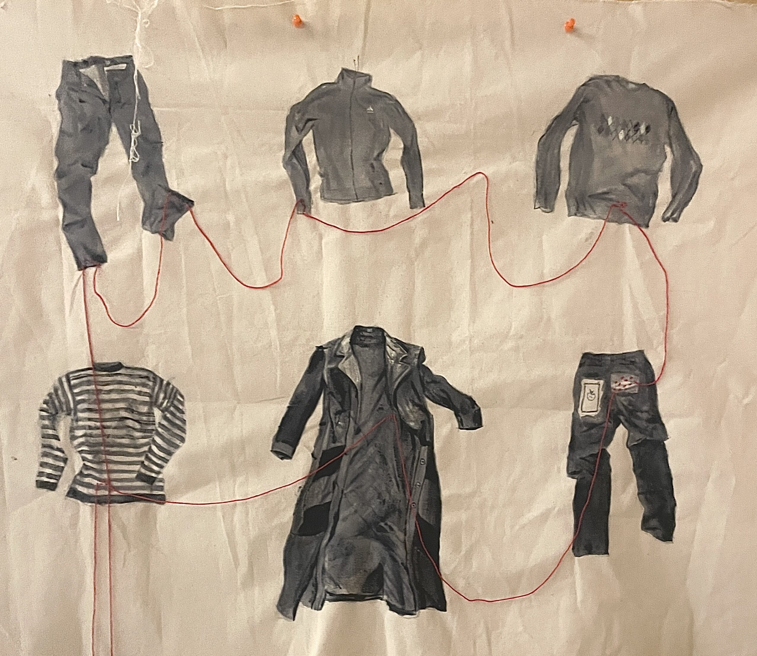 Articles of clothing connected through red thread 